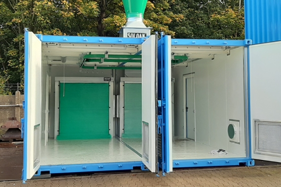 Lieferung und Aufbau einer mobilen Farbspritzkabine, bestehend aus 2 x 20´Containern mit Farbnebelabsaugwand, Ex-Beleuchtung und Hängebahn